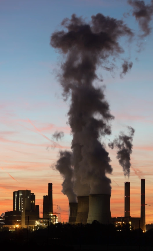 smoke-emitting-from-factory-against-sky