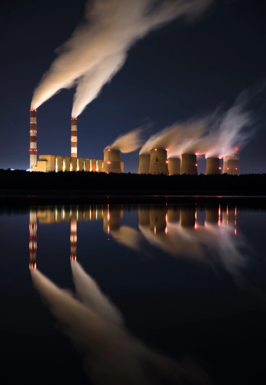 smoke-emitting-from-factory-with-reflection-lake